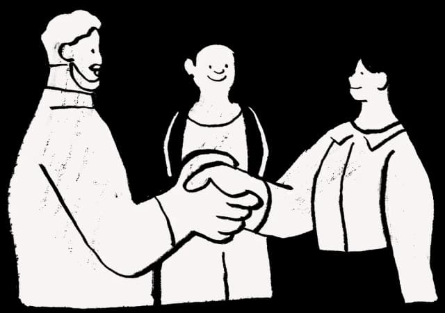 lavoratori che si danno la mano